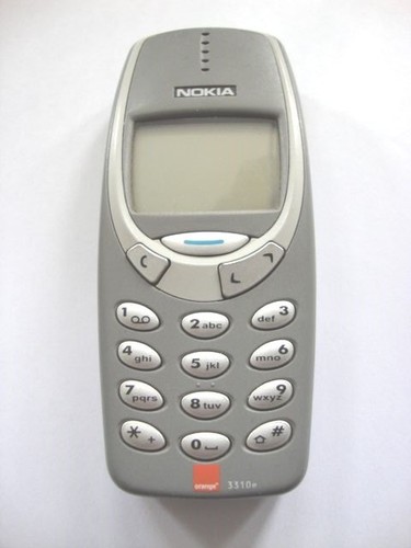 Grey nokia 3310 mobile phone - grey,