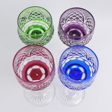 A SET OF FOUR ROYAL BRIERLEY CUT & FLASHED COLOURED CRYSTAL HOCK GLASSES