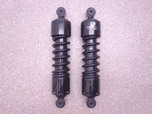 Progressive suspension strut