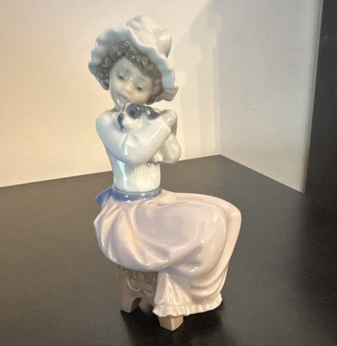 Nao porcelain seated - seated, girl