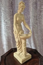   A Santini semi- Nude woman