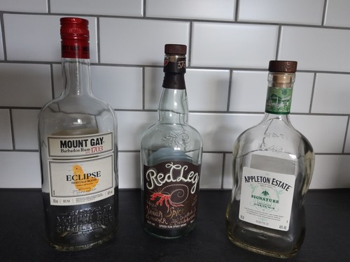Empty rum bottles - bottles,