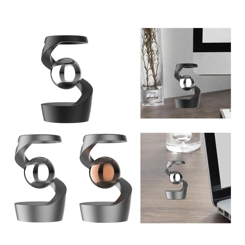 Gravity defying kinetic toy - gravity,