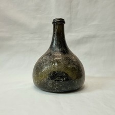 Antique 19th Century onion bottle with J&B embossed on the base, dirty exterior.