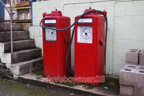 Photo two old petrol pumps - ,