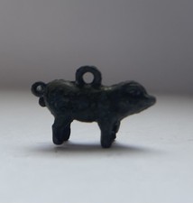 Antique Lead Pig Charm. Size 2cm long x 1.3cm high.  