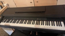 black Yamaha Clavinova clp 311 with stool