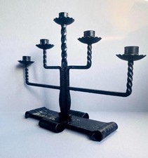 Brutalist black heavy black wrought iron candleabra.