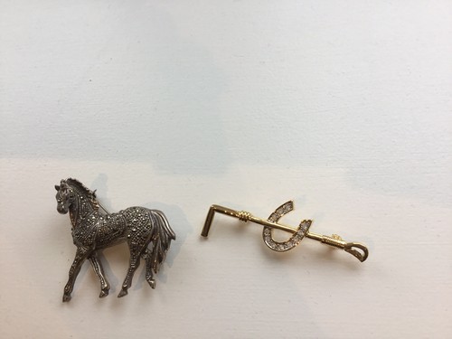 Two horse related brooches - horse,