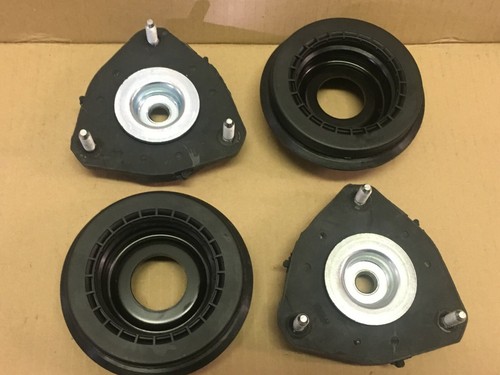 Pair front strut top - of,