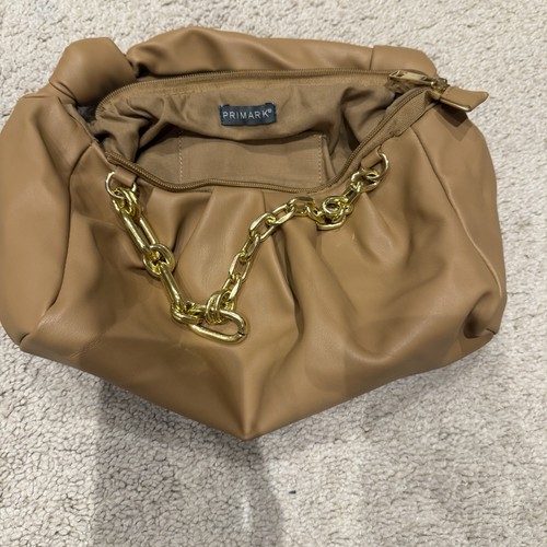 Primark small beige knot hand - primark,