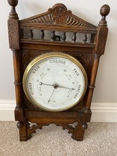 Antique oak wall hanging barometer.