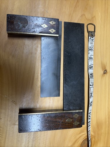 Pair rosewood brass and - of,