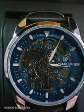 MEN’S TALIS CO 7820 AUTOMATIC WATCH – BLUE SKELETON DIAL AND CASE  BLACK LEATHER