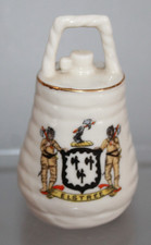 WWI ARCADIAN CRESTED CHINA MODEL OF BOMB DROPPED FROM A ZEPPELIN ELSTREE CREST