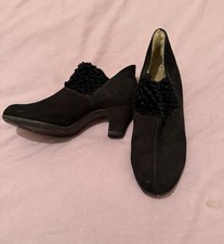 A pair of vintage black suede