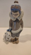 LLADRO ESKIMO BOY W/PET POLAR