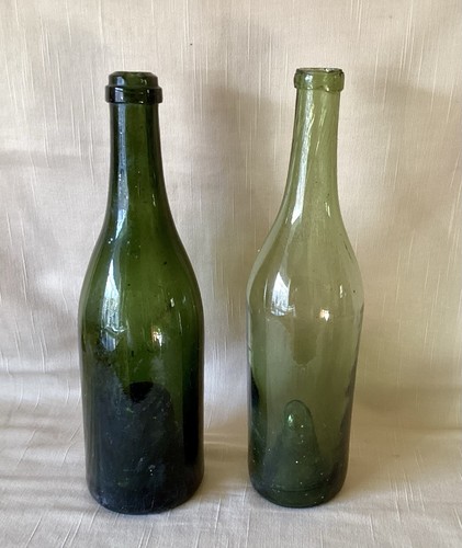 Two old green bottles - two,