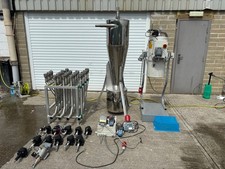 Plastics central vac feed system