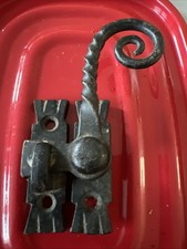 Vintage curly-tail window