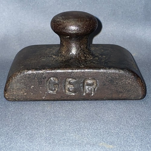 Ger cast iron paperweight - ger,