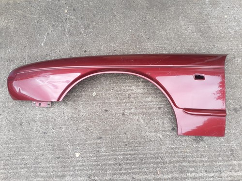 Front passenger wing - front,
