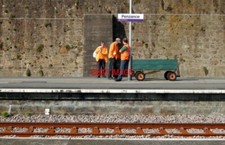 PHOTO  PENZANCE RAILWAY STATION (32) TRAIN-CLEANING STAFF ON PLATFORM 1 WAITING