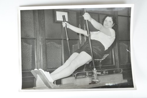 Woman rowing machine - rowing,
