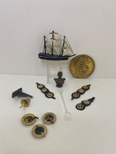 SHIP AND BRASS DISPLAY ITEMS
