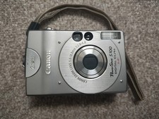 Canon PowerShot S100 Elph Camera 1.5 LCD 2.1MP Battery, Charger & Flash Card.