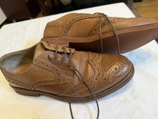 brown leather brogue-style