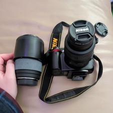 Nikon D3000 DSLR Camera with 18-55mm And sigma df 300mm  Lens and Charger 