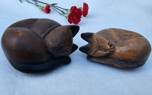 Hand carved wooden cat - hand,