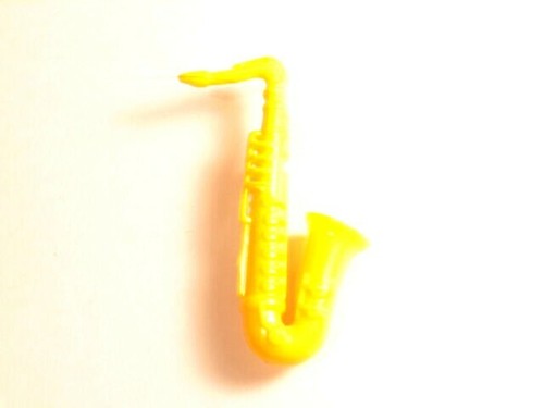 Old yellow plastic saxophone - old,