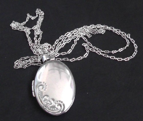 Large silver locket with p - locket,