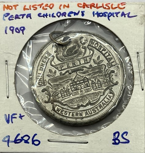 1909 white metal medallion - 1909,