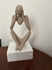 THINKING MAN SITTING