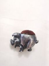 A vintage miniature silver plated pig pin cushion