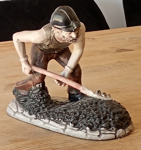 Ceramic porcelain figure - , a