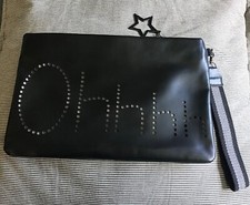 Mango,black cut out Ohhhh design clutch bag,clip on wrist strap,star zip charm.
