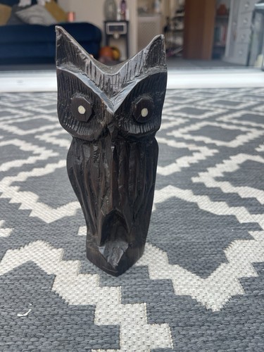 Hand carved dark wooden - dark,