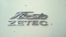 FORD FIESTA ZETEC 2010 YEAR REAR BOOT SILVER LOGO WITH LETTERS (MK7)