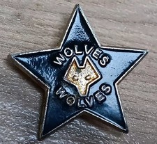 A VINTAGE, 'WOLVES' (FOOTBALL),' STAR SHAPED,ENAMELLED BADGE.