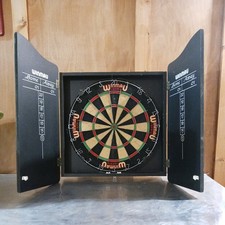 Dartboard in cabinet