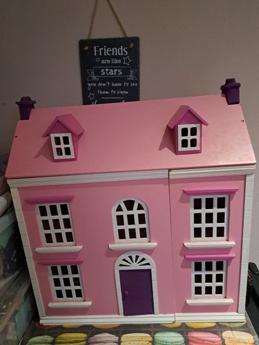 Wooden dolls house with some - wooden,