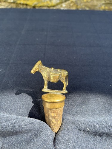 Brass donkey and bucket bottle - and,