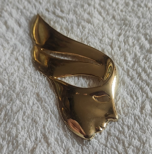 Gold tone face mask - face,