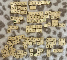 137 Spare Scrabble Tiles & 2