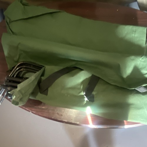 Green camping bed with metal