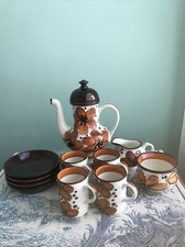 SCHRAMBERG GERMAN POTTERY- COFFEE POT, CREAM JUG, SUGAR BOWL, 4 SAUCERS, 4 CUPS